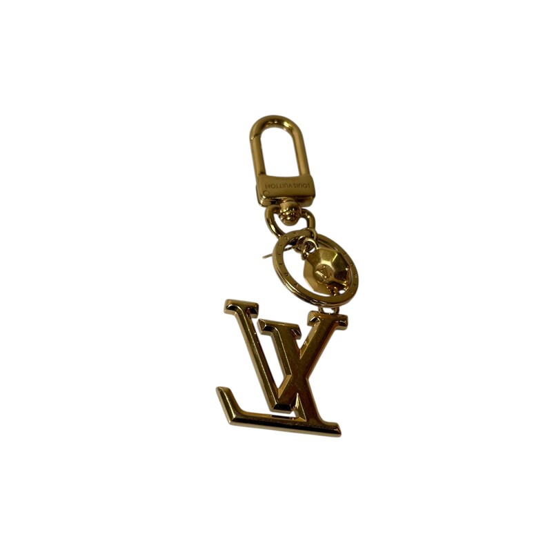 Louis Vuitton  LV Facettes Bag Charm keychain<br />
<br />
Style Code: M65216<br />
<br />
In very good condition. Some scratching on hardware.<br />
<br />
Comes with original dust bag and box.