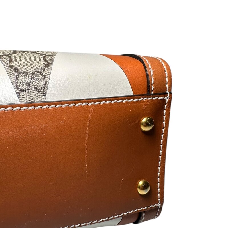 Gucci Diana Rhombus Leather Bamboo Top Handle<br />
<br />
2 Way Crossbody Bag<br />
<br />
Style Code: 721168.520981<br />
<br />
Dimensions:<br />
Handle Drop: 3.25<br />
Height: 9.5<br />
Width: 10.75<br />
Depth: 4.25<br />
<br />
In very good condition. Very faint marks on the bottom of the bag.<br />
<br />
Does not come with original dust bag or box.