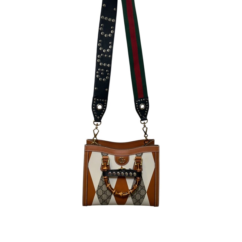 Gucci Diana Rhombus Leather Bamboo Top Handle

2 Way Crossbody Bag

Style Code: 721168.520981

Dimensions:
Handle Drop: 3.25
Height: 9.5
Width: 10.75
Depth: 4.25

In very good condition. Very faint marks on the bottom of the bag.

Does not come with original dust bag or box.