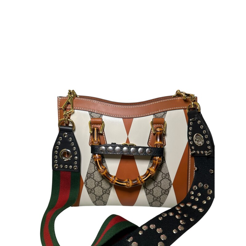 Gucci Diana Rhombus Leather Bamboo Top Handle

2 Way Crossbody Bag

Style Code: 721168.520981

Dimensions:
Handle Drop: 3.25
Height: 9.5
Width: 10.75
Depth: 4.25

In very good condition. Very faint marks on the bottom of the bag.

Does not come with original dust bag or box.