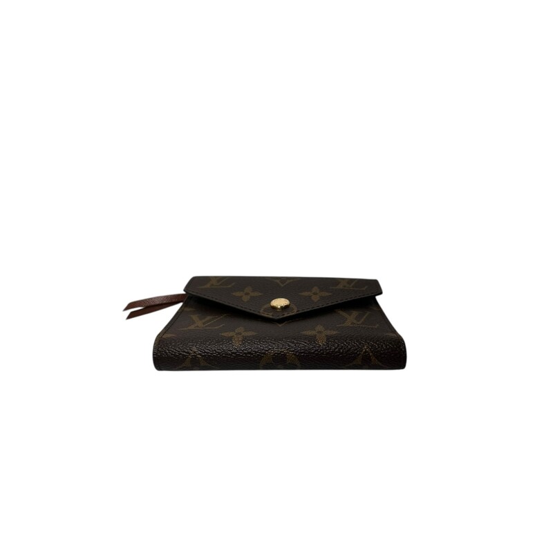 Louis Vuitton Victorine Wallet Monogram<br />
<br />
Date Code: Chipped<br />
<br />
Dimensions:<br />
4.7 x 3.7 x 1 inches<br />
(Length x Height x Width)<br />
<br />
In excellent condition. New<br />
<br />
COmes with original dust bag. No box.