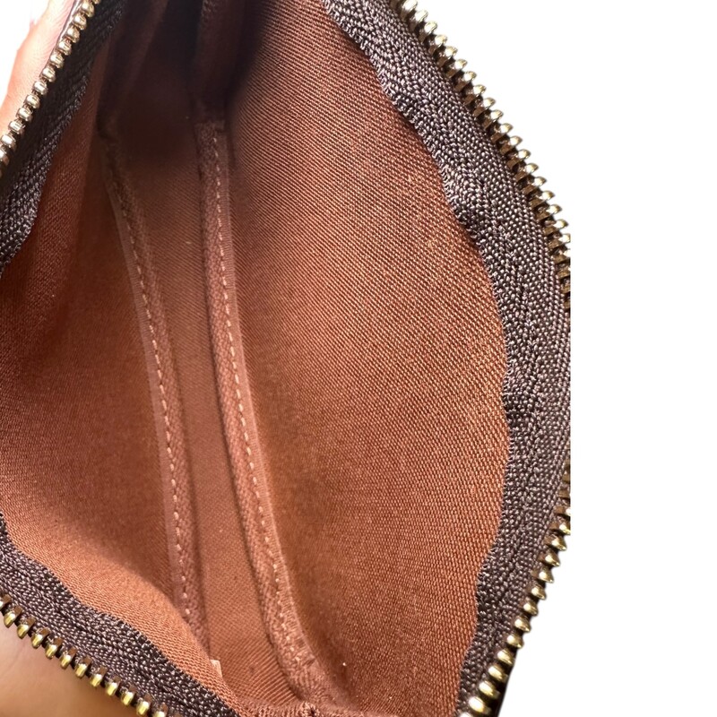 Louis Vuitton  Coated Canvas Mini Pouchette

Date Code:SF5203

Dimensions: 6.1 x 4.1 x 1.6 inches
                         (Length x Height x Width)

In excellent condition. Like new. Faint scratching on the hardwarw.

Comes with the original dust bag and box.