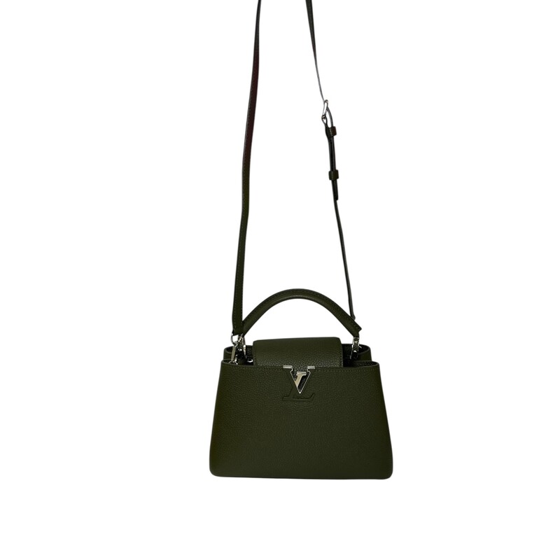 Louis Vuitton Capucines BB Khaki Taurillon leather<br />
<br />
Date Code; Chipped<br />
<br />
Dimensions:<br />
10.6 x 7.1 x 3.5 inches<br />
(Length x Height x Width)<br />
<br />
In excellent condition. Light scuffs to top of hardware.<br />
<br />
Comes with the original dust bag. No box.