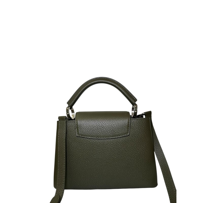 Louis Vuitton Capucines BB Khaki Taurillon leather<br />
<br />
Date Code; Chipped<br />
<br />
Dimensions:<br />
10.6 x 7.1 x 3.5 inches<br />
(Length x Height x Width)<br />
<br />
In excellent condition. Light scuffs to top of hardware.<br />
<br />
Comes with the original dust bag. No box.