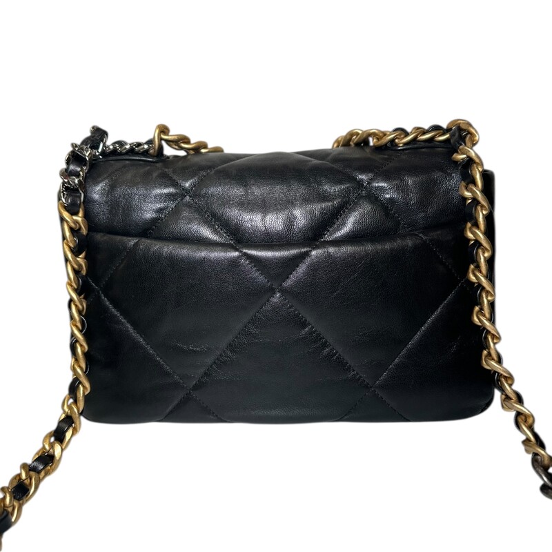 Chanel Lambskin Quilted Medium Chanel 19 Flap Black<br />
<br />
Dimesnions:<br />
Base length: 10.5 in<br />
Height: 7 in<br />
Width: 3 in<br />
Drop: 3.5 in<br />
Drop: 20 in<br />
<br />
In excellent condition. Light scuffing to leather and hardware.<br />
<br />
Comes with original  dust bag and box.