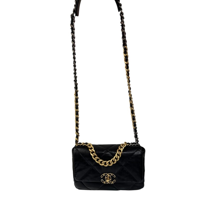 Chanel Lambskin Quilted Medium Chanel 19 Flap Black<br />
<br />
Dimesnions:<br />
Base length: 10.5 in<br />
Height: 7 in<br />
Width: 3 in<br />
Drop: 3.5 in<br />
Drop: 20 in<br />
<br />
In excellent condition. Light scuffing to leather and hardware.<br />
<br />
Comes with original  dust bag and box.