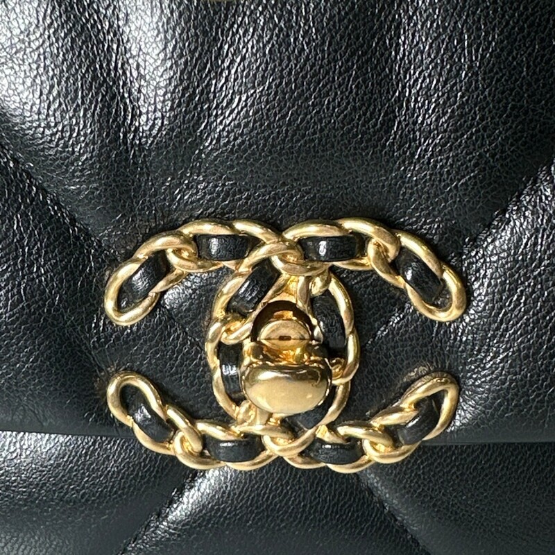 Chanel Lambskin Quilted Medium Chanel 19 Flap Black<br />
<br />
Dimesnions:<br />
Base length: 10.5 in<br />
Height: 7 in<br />
Width: 3 in<br />
Drop: 3.5 in<br />
Drop: 20 in<br />
<br />
In excellent condition. Light scuffing to leather and hardware.<br />
<br />
Comes with original  dust bag and box.
