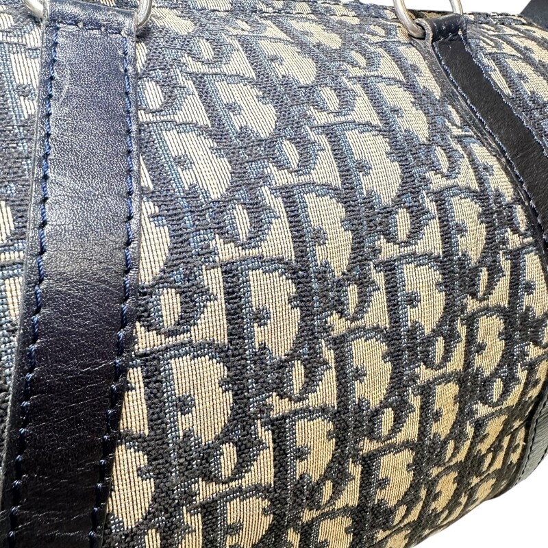 Christian Dior Bagages Boston Duffle Monogram Bag<br />
<br />
Vintage 1980s<br />
<br />
Dimensions: 12 L x9.5 H inches<br />
<br />
In very good condition. Minor mark on the canvas. Some corner wear.<br />
<br />
Does not come with original dust bag or box/