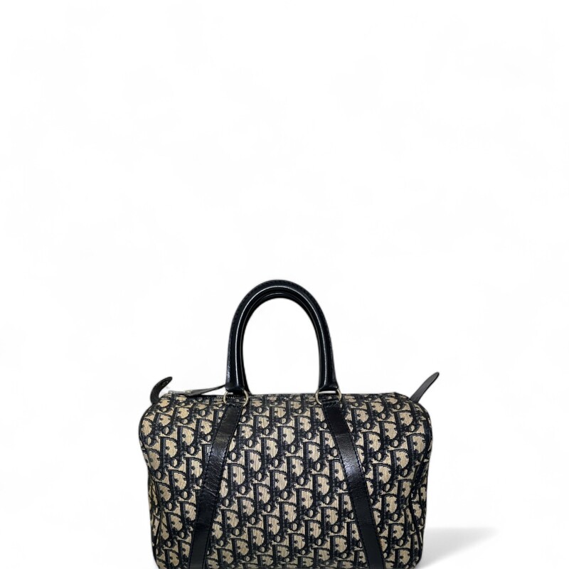 Christian Dior Bagages Boston Duffle Monogram Bag

Vintage 1980s

Dimensions: 12 L x9.5 H inches

In very good condition. Minor mark on the canvas. Some corner wear.

Does not come with original dust bag or box/