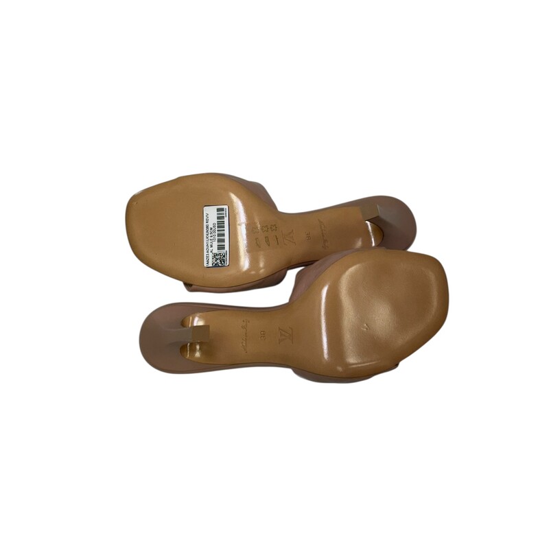 Louis Vuitton Revival Nude<br />
<br />
Size: 38<br />
<br />
Code GG0272<br />
<br />
In excellent condition. Light scuff on toe.<br />
<br />
Comes with the original dust bag. No box.