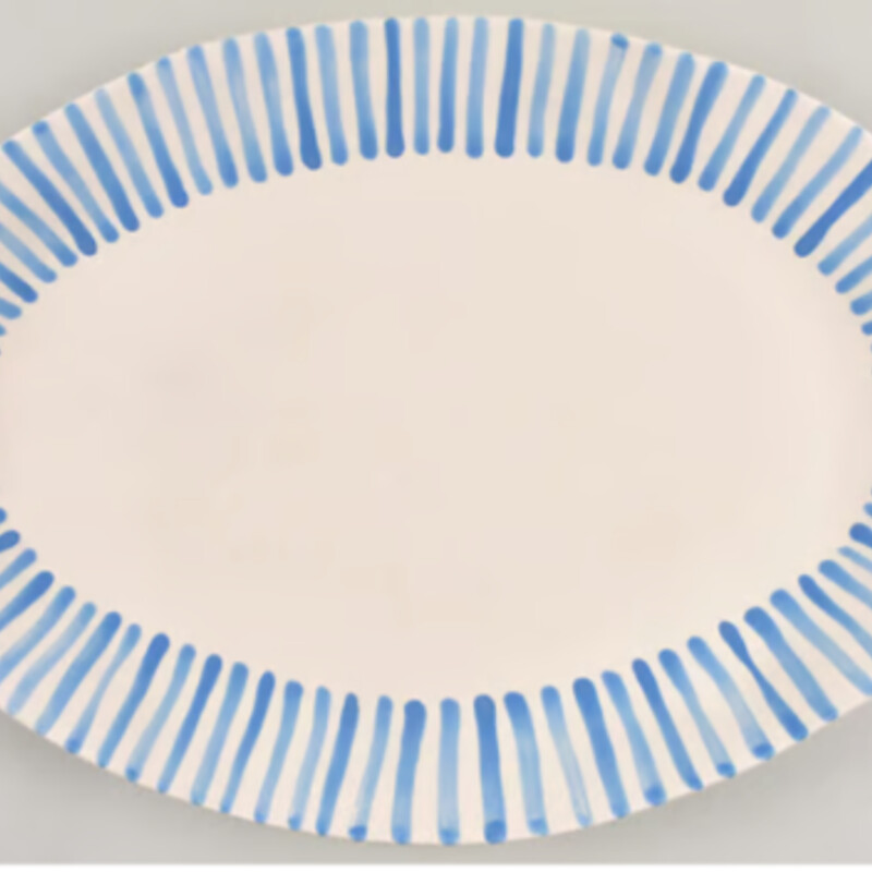 Vietri Modello Oval Platter
Blue Cream Stoneware
Size: 17x12w
The Modello Collection is inspired by the fashion trends lining the runways of Milan, and it brings sophistication and durability to everyday dining with a lively stripe design. Microwave, Dishwasher, Freezer and Oven Safe.   NEW- Retail $169  Coordinating Pieces Sold Separately.
