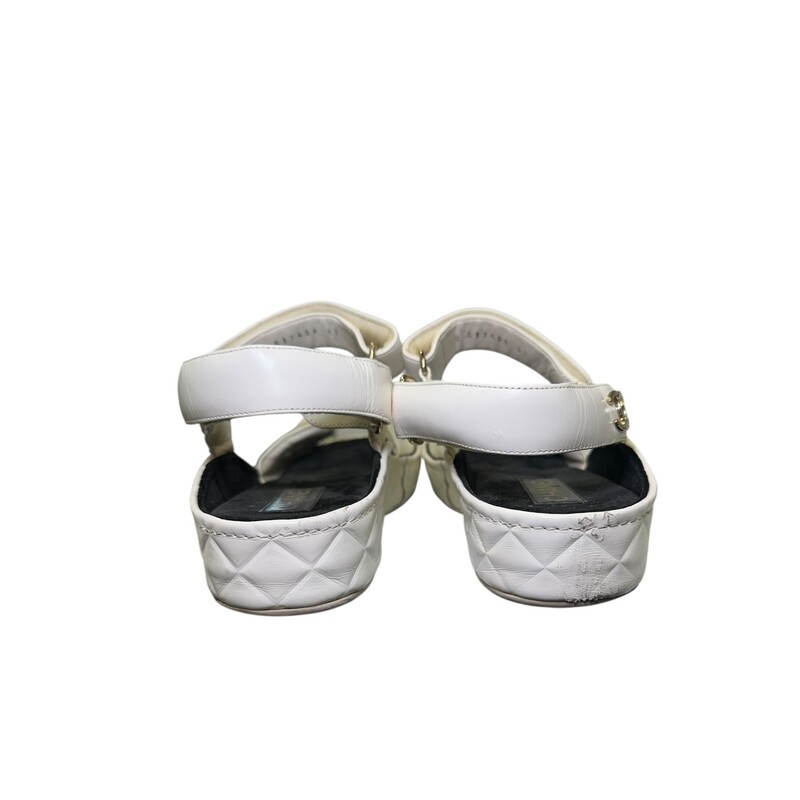 Chanel Shiny Platform Logo Espadrilles<br />
<br />
Size 42<br />
<br />
A G37456<br />
<br />
In good condition. Wear throughout the shoes. Yellowing around the velcor. Scuffs around the shoes and back of heels.<br />
<br />
Does not come with the original dust bag or box.