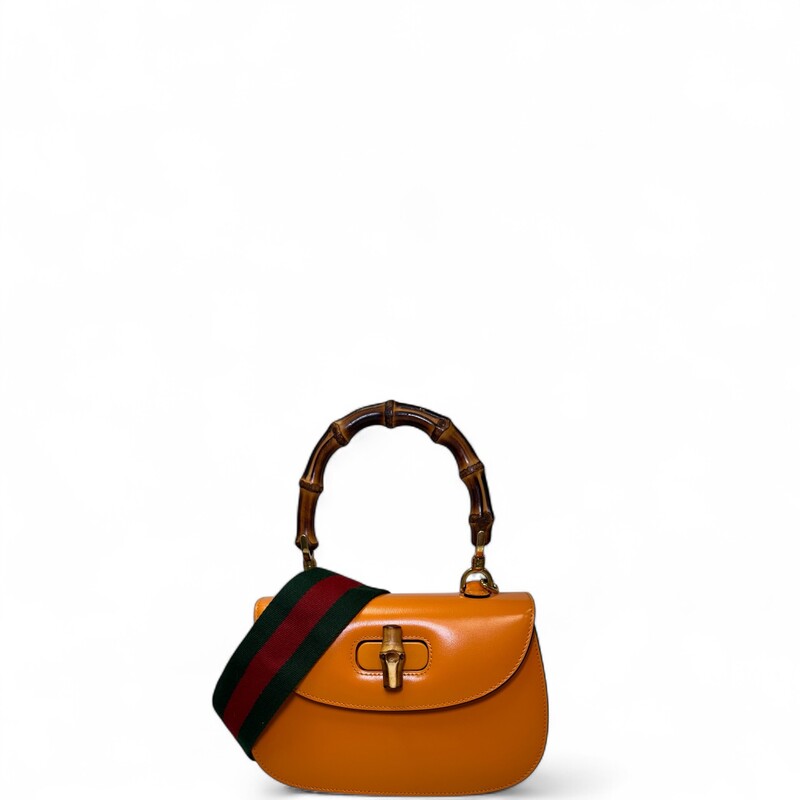 Gucci Bamboo 1947 Top Handle Orange Small

Syle Code: 675797 498879

Dimensions:
Length: 8.25 in
Height: 6 in
Width: 2.75 in
Drop: 4.25 in
Drop: 22 in
Drop: 21.75 in

In excellent condition. Does not come with the leather strap, comes with the web canvas strap.

Does not come with the original dust bag or box.