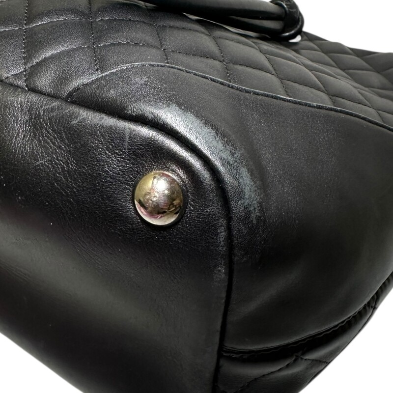 Chanel Cambone Leather Tote<br />
<br />
Serial Code: 10596778<br />
<br />
Dimensions:<br />
Base length: 11.75 in<br />
Height: 9.5 in<br />
Width: 5.75 in<br />
Drop: 8 in<br />
<br />
In very good condition. Some corner wear and interior marks.<br />
<br />
Does not come with original dust bag or box.