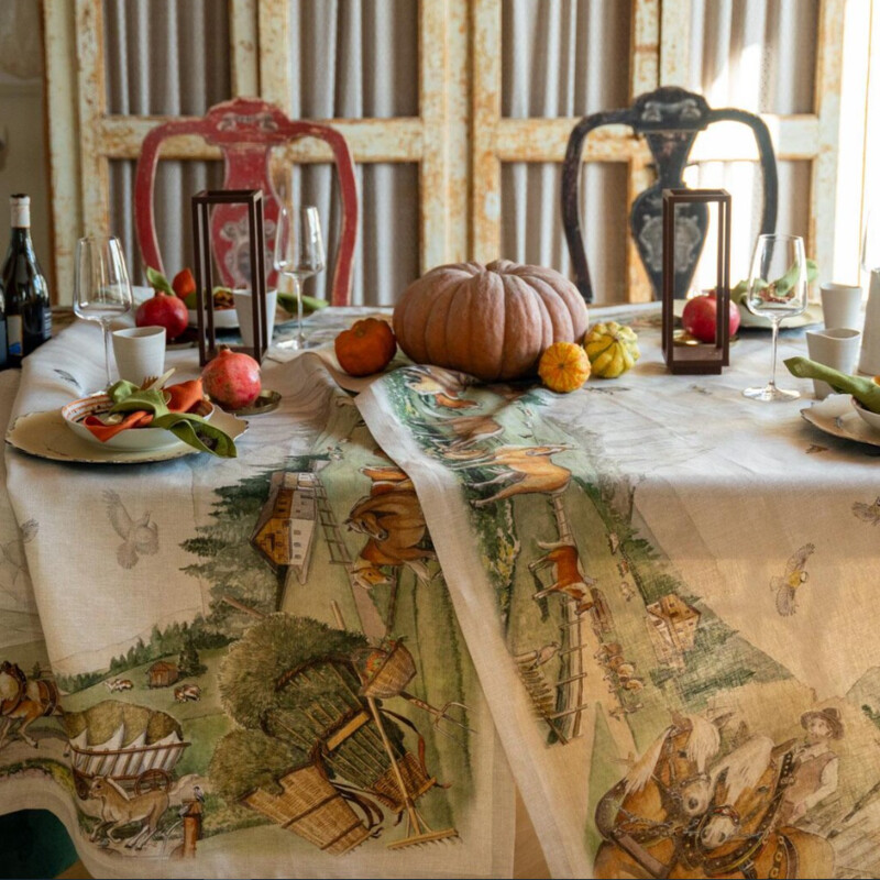 Tessitura Toscany Olives Naturalle Tablecloth
Taupe Green Purple  100% Linen
Size: 67x67
D.O.P. -- which means Denominazione di Origine Protetta (or Protected Origin Destination) has been applied to these olive trees shown during harvest.  Printed on a natural colored linen with a natural colored border all around. 100% linen.  Tessitura Toscana Telerie is a wonderful linen company that has been making their products for over 70 years in Tuscany, Italy.
NEW Retail $180