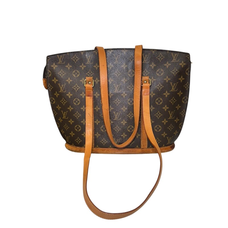Louis Vuitton Babylone Tote Handbag<br />
<br />
Date Code: VI 0976<br />
<br />
Dimensions:<br />
Height: 12.25<br />
Width: 14<br />
Depth: 4.5<br />
<br />
In good condition. Waters marks on the leather and interior marks.The interior zippered pocket has some peeling and stickiness.<br />
<br />
Does not come with original dust bag or box,