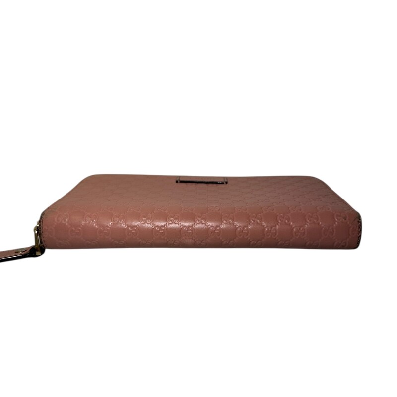 Gucci Micro GG Zippy Pink Wallet<br />
<br />
Style Code: 449391.534563<br />
<br />
Dimensions: 8L x 4H inches<br />
<br />
In good condition. Some corner wear.<br />
<br />
Does not come with original dust bag or box.