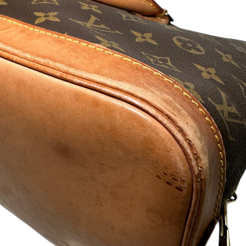 Louis Vuitton Alma Mongram PM<br />
<br />
Date Code: BA0945<br />
<br />
Dimensions: 12 L x 9 H inches<br />
<br />
In very good condition. Some water marks and wear at the base of the bag. Some natural patina of the leather. No lock or key.<br />
<br />
Does not come with original dust bag or box.