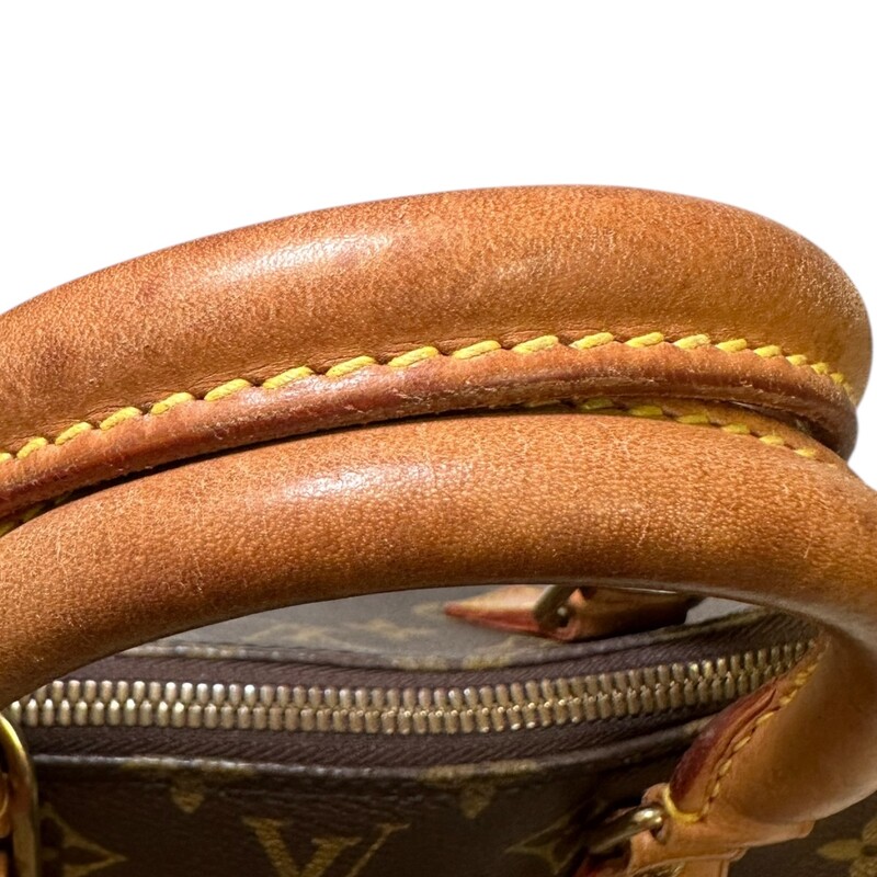 Louis Vuitton Alma Mongram PM<br />
<br />
Date Code: BA0945<br />
<br />
Dimensions: 12 L x 9 H inches<br />
<br />
In very good condition. Some water marks and wear at the base of the bag. Some natural patina of the leather. No lock or key.<br />
<br />
Does not come with original dust bag or box.