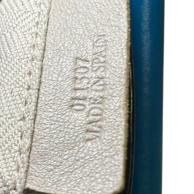 Loewe Puzzle Leather Blue Bag  Crossbody.<br />
<br />
Serial Code:011507<br />
<br />
Dimensions:12 L x 10 H inches<br />
<br />
In fair condition. Scratches and discoloration throughout the leather. Corner wear and interior marks.<br />
<br />
Does not come with original dust bag or box.