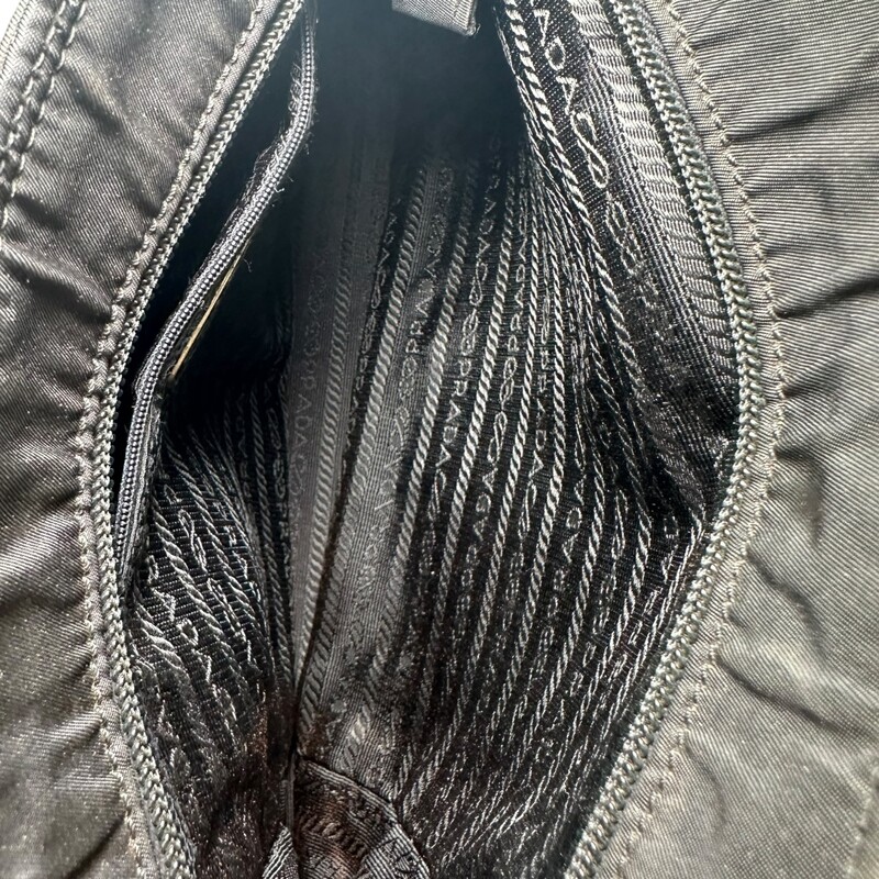 Prada Beaded Satin Sequin Tote Bag<br />
<br />
Factory code:26<br />
<br />
Dimensions: 9L x 9H inches<br />
<br />
In very good condition. Some faint marks on the nylon.<br />
<br />
Comes with original dust bag. No box.