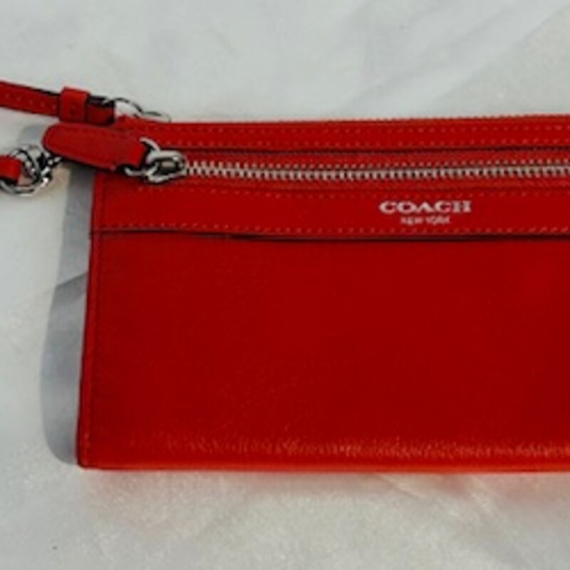 Coach Leather Zippy Wristlet
Orange
Size: 7.5x4.5H