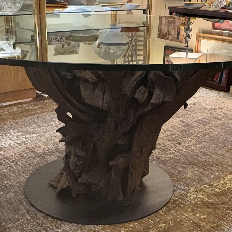 Custom Carved Trunk Tree Dining Table with Glass Top
Dark Brown Base Thick Clear Glass Top
Size: 63x31.5H
Unique carved wood table base that depicts a tree trunk with cut branches. The fine details show the small roots, branches and details like no other.
Retail $10K