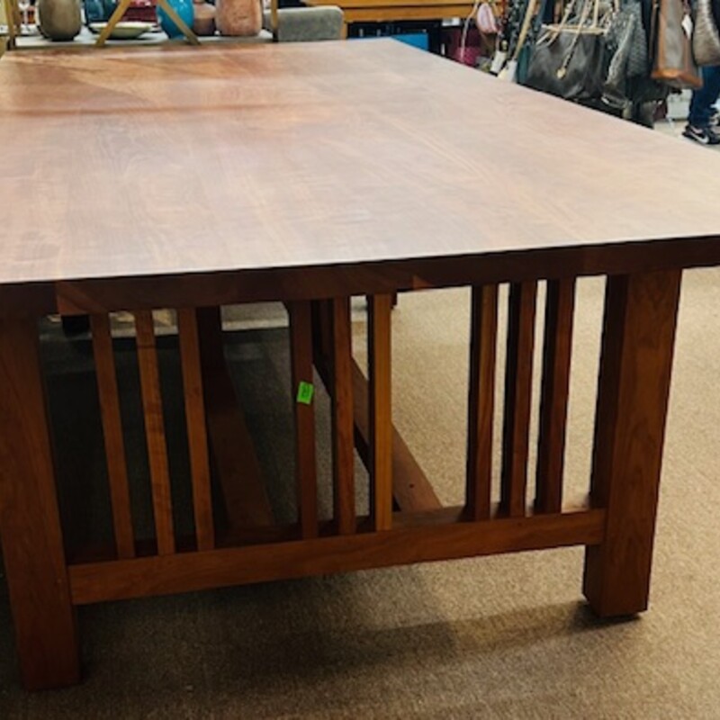 ThomasMoser Arts&Crafts Dining Table<br />
Solid Cherry<br />
Size: 48x110L<br />
Custom Made by Thomas Moser, founded over 50 years ago in New Gloucester, Maine,  with the intent of restoring the lost art of making furniture well. Today, some 70 men and women in their  workshop continue to craft pieces the same way we did at the beginning: one piece, one craftsman, one signature. We rely on sustainable North American hardwoods, traditional joinery executed by hand, and individual workmanship. We are guided by our mission to build furniture that celebrates the natural beauty of wood, is of simple, unadorned, graceful lines, and is crafted for a long, useful life.<br />
Retail $15K