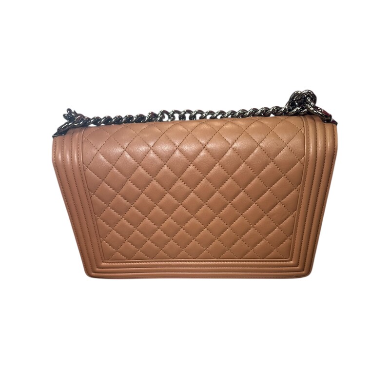 Chanel Boy Calfskin Large Tan

Code: 20418***

Dimensions.

In good condition. Wear around the corners and throughout the bag. scratching to hardware. Major interior staining. Bag deformation on bottom from improper storage.

Does not come with the original dust bag or box.