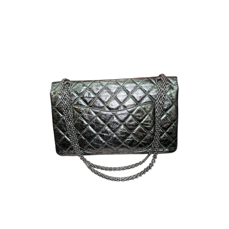 Chanel Reissue 2.55 Metallic 227 Green Flap<br />
<br />
Code: 1200****<br />
<br />
Dimensions:<br />
12W x 8H x 4D<br />
10 handle drop<br />
18 strap drop<br />
<br />
In very good condition. Light wear throughout the bag.  Light scratching to hardware.<br />
<br />
Does not come with the original dust bag or box.
