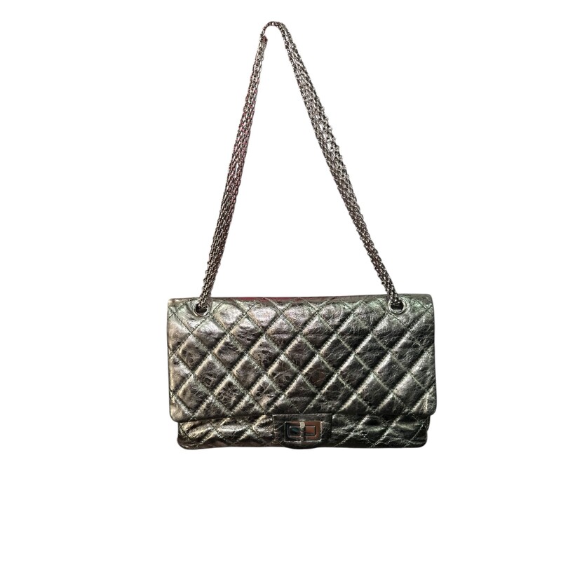Chanel Reissue 2.55 Metallic 227 Green Flap<br />
<br />
Code: 1200****<br />
<br />
Dimensions:<br />
12W x 8H x 4D<br />
10 handle drop<br />
18 strap drop<br />
<br />
In very good condition. Light wear throughout the bag.  Light scratching to hardware.<br />
<br />
Does not come with the original dust bag or box.