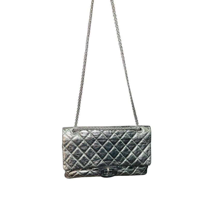 Chanel Reissue 2.55 Metallic 227 Green Flap<br />
<br />
Code: 1200****<br />
<br />
Dimensions:<br />
12W x 8H x 4D<br />
10 handle drop<br />
18 strap drop<br />
<br />
In very good condition. Light wear throughout the bag.  Light scratching to hardware.<br />
<br />
Does not come with the original dust bag or box.