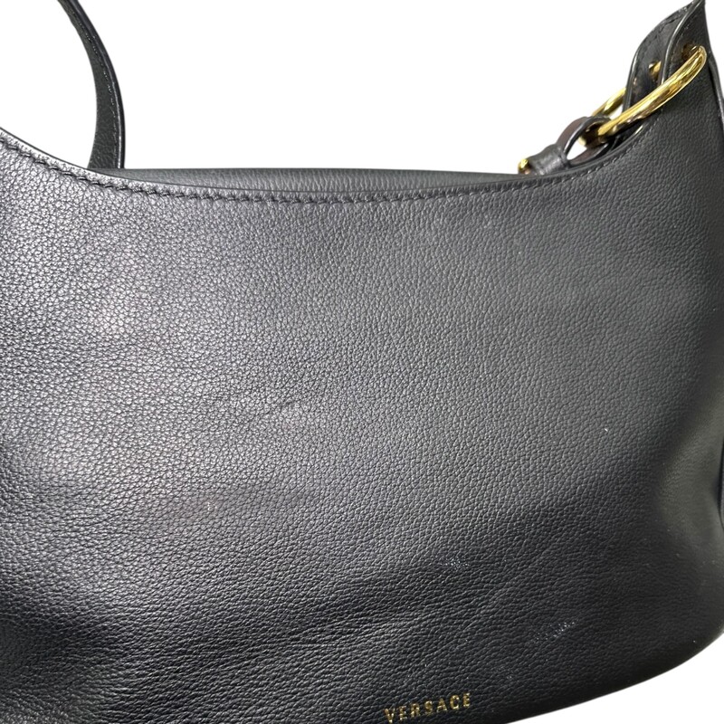Versace Medusa Leather Shoulder Bag<br />
<br />
045FE65A986A80<br />
<br />
Dimensions:<br />
12inW x 7.5inHx3inD<br />
<br />
In very good condition. Light wear to the exterior leather.<br />
<br />
Does not come with the original dust bag or box.
