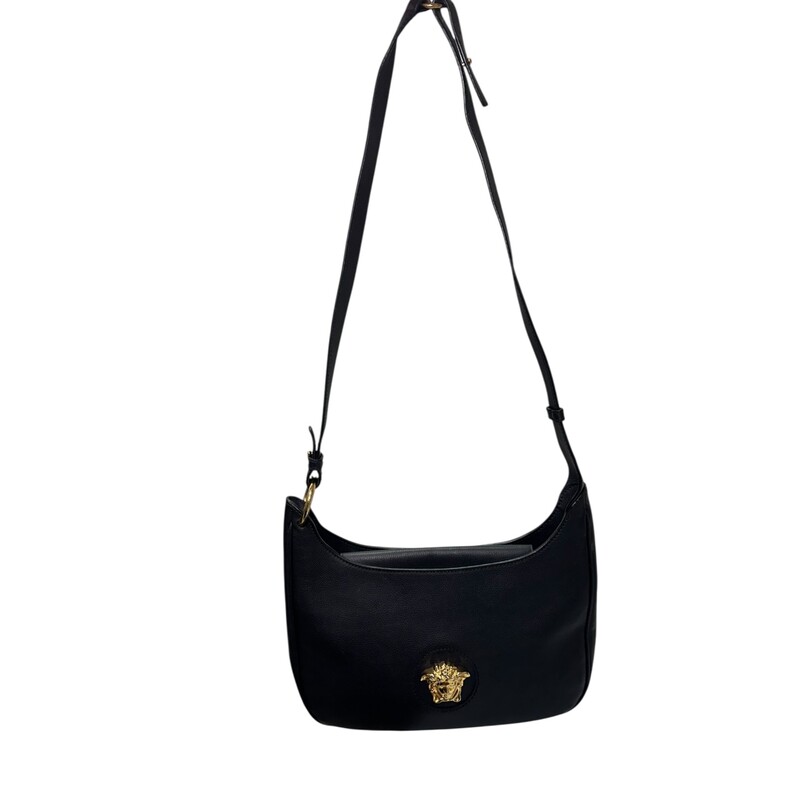 Versace Medusa Leather Shoulder Bag<br />
<br />
045FE65A986A80<br />
<br />
Dimensions:<br />
12inW x 7.5inHx3inD<br />
<br />
In very good condition. Light wear to the exterior leather.<br />
<br />
Does not come with the original dust bag or box.