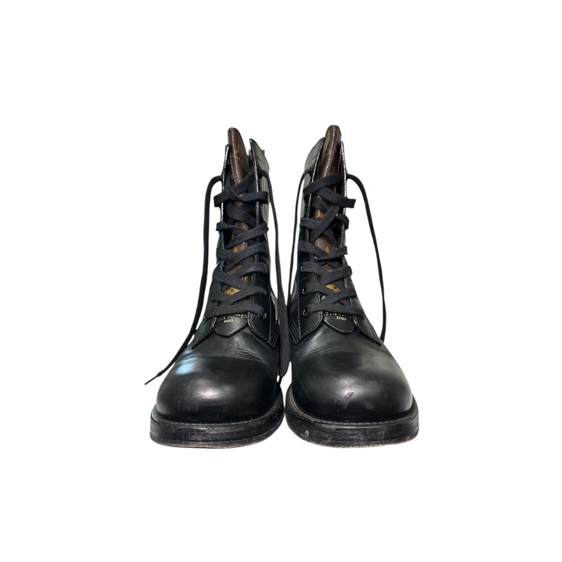 Louis Vuitton Metropolis Leather Combat Boots<br />
<br />
Size 38<br />
<br />
In very good condition. Light crinkling at the toe.<br />
<br />
Comes with the original dust bags. No box.