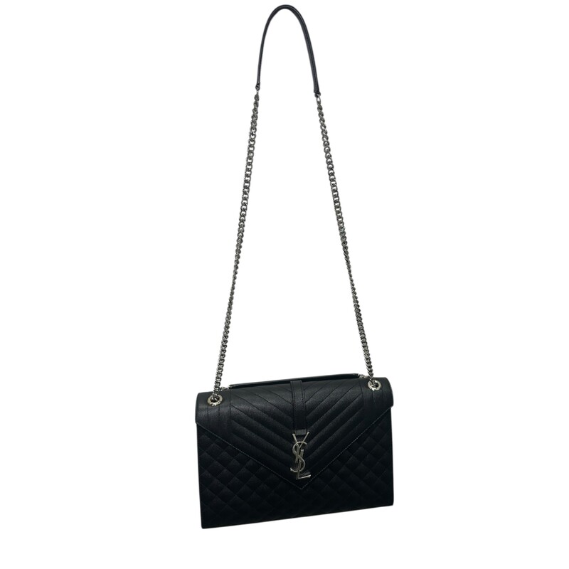 Saint Laurent Triquil Enveloped Grained Leather Bag<br />
<br />
Style Code:MAL600166.0322<br />
<br />
Dimensions:<br />
Base length: 9.25 in<br />
Height: 6.5 in<br />
Width: 2.5 in<br />
Drop: 12 in<br />
Drop: 22.5 in<br />
<br />
In very good condition. Some minor sctarches on hardware.<br />
<br />
Comes with the original dust bag. No box.