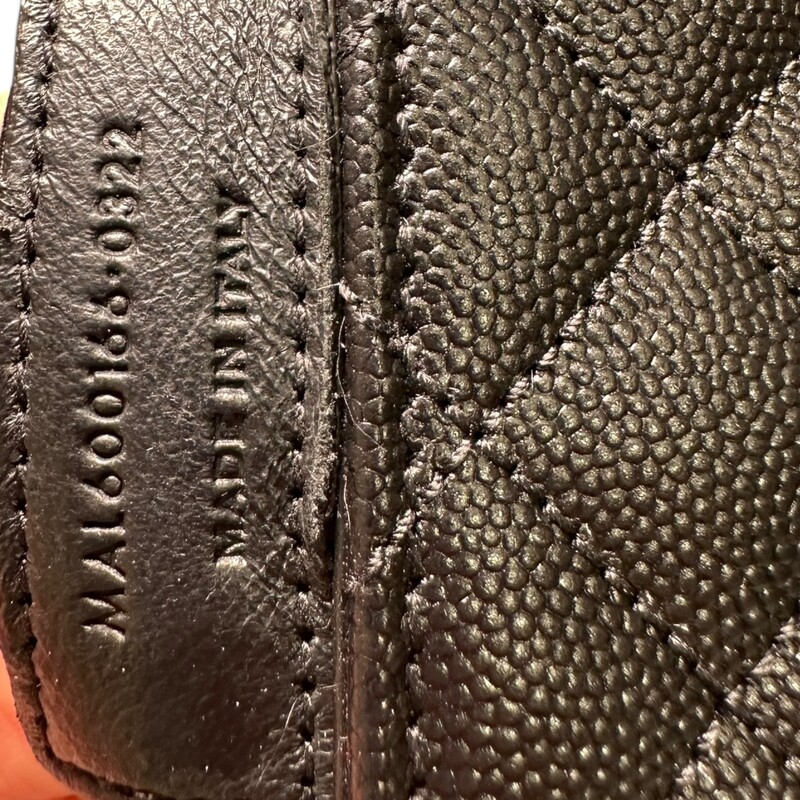 Saint Laurent Triquil Enveloped Grained Leather Bag<br />
<br />
Style Code:MAL600166.0322<br />
<br />
Dimensions:<br />
Base length: 9.25 in<br />
Height: 6.5 in<br />
Width: 2.5 in<br />
Drop: 12 in<br />
Drop: 22.5 in<br />
<br />
In very good condition. Some minor sctarches on hardware.<br />
<br />
Comes with the original dust bag. No box.