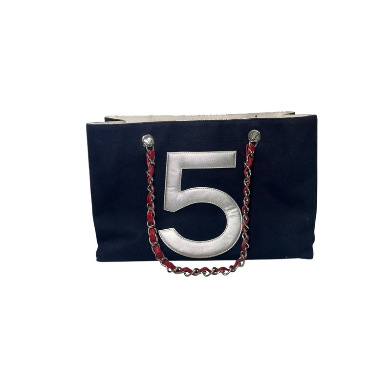 Chanel Quilted N°5 Shopping Tote<br />
<br />
Code:<br />
75200**<br />
<br />
Dimensions:<br />
Length: 11.75 in<br />
Width: 2.75 in<br />
Height: 7.50 in<br />
Drop: 7.00 in<br />
<br />
In good condition. Light staining near the top of the bag.<br />
<br />
Does not come with the original dust bag or box.