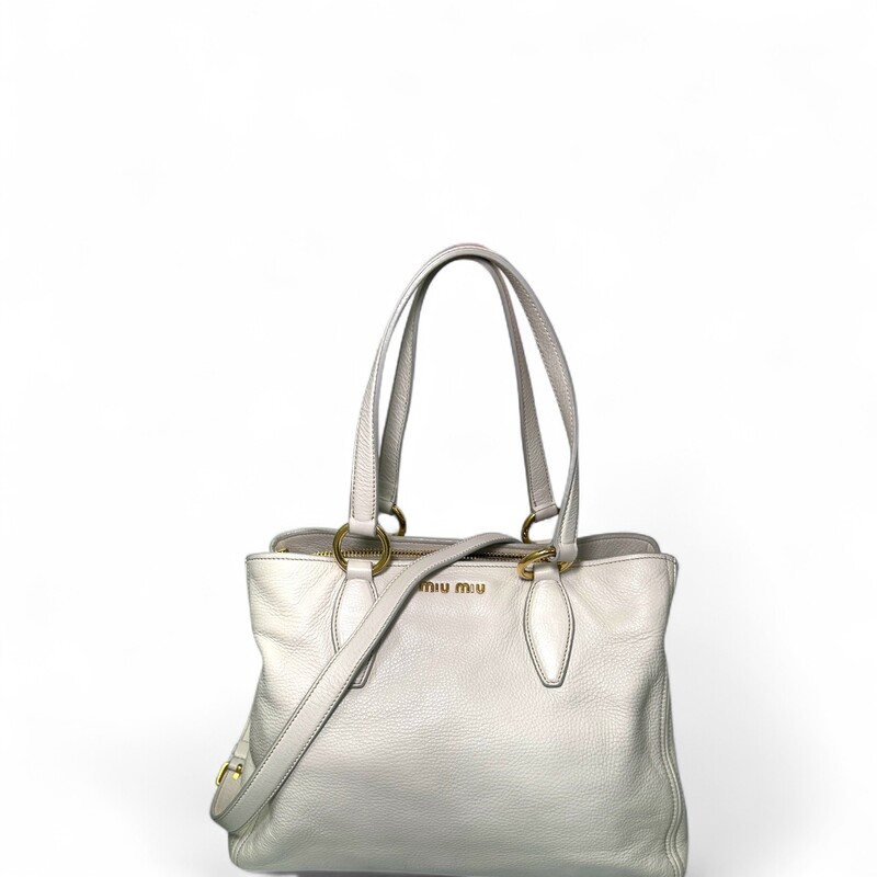 Miu Miu Vitello Daino Tote Pomice

Factory Code:158

Dimensions:
Base length: 12.50 in
Height: 9.25 in
Width: 5.50 in
Drop: 8.00 in
Drop: 20.00 in

In very good condition.  A few scuffs on the back and front of the bag.

Comes with the original dust bag. No box.