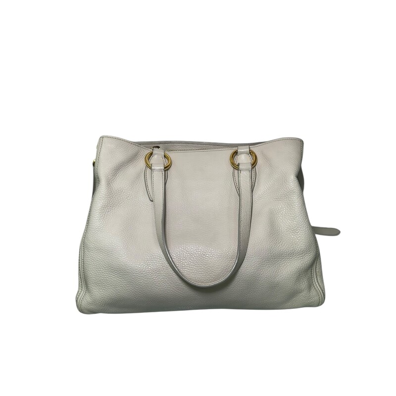 Miu Miu Vitello Daino Tote Pomice<br />
<br />
Factory Code:158<br />
<br />
Dimensions:<br />
Base length: 12.50 in<br />
Height: 9.25 in<br />
Width: 5.50 in<br />
Drop: 8.00 in<br />
Drop: 20.00 in<br />
<br />
In very good condition.  A few scuffs on the back and front of the bag.<br />
<br />
Comes with the original dust bag. No box.
