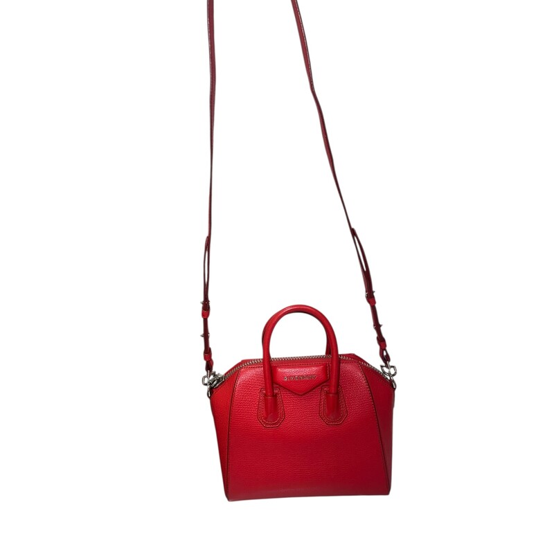 Givenchy Antigonia Mini Red<br />
<br />
Date Code:<br />
MP B 01667<br />
<br />
Dimensions:<br />
8.5W x 7.5H x 5D<br />
3 handle drop<br />
19-23 strap drop<br />
<br />
In very good condition. Light scuffs to the exterior.<br />
<br />
Comes with the origina dust bag. No box.