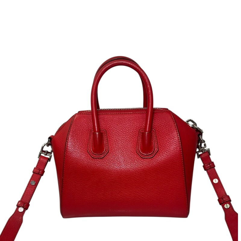 Givenchy Antigonia Mini Red<br />
<br />
Date Code:<br />
MP B 01667<br />
<br />
Dimensions:<br />
8.5W x 7.5H x 5D<br />
3 handle drop<br />
19-23 strap drop<br />
<br />
In very good condition. Light scuffs to the exterior.<br />
<br />
Comes with the origina dust bag. No box.
