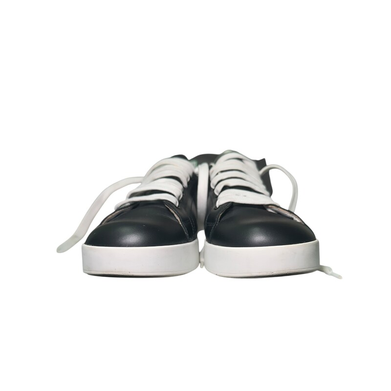 Dolce & Gabbana Portofino Black & White Sneakers<br />
<br />
In very good condition. Some minor wear on the leather.<br />
<br />
Comes with original dust bag. No box.