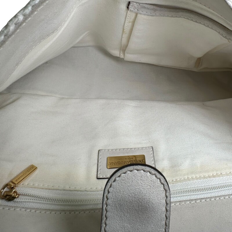 D&G Sicily Woven Large Tote<br />
<br />
Dimensions:<br />
DEPTH	5 in<br />
HEIGHT	11 in<br />
WIDTH	12 in<br />
<br />
In good condition. Light staining throughout the leather.<br />
<br />
Does not come with the original dust bag or box.