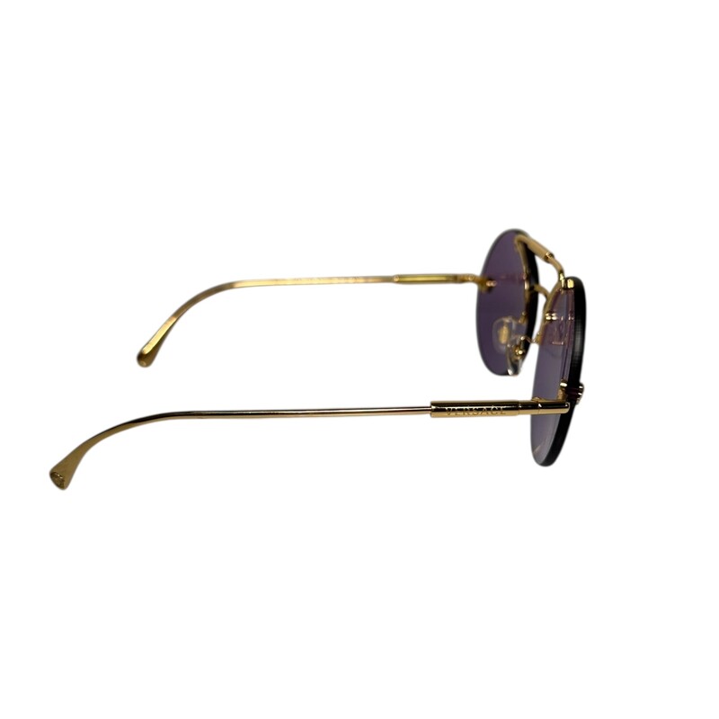 Versace Rimless Purple Circle Sunglasses

In very good condition. Some minor scratches on the lenses,

Does not come with original dust bag or case.