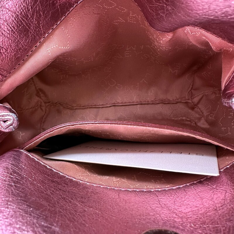 Stella McCartney Falabella Chrome Pink Tote<br />
<br />
Code: 391698 W70005<br />
<br />
Dimensions:<br />
Base length: 7 in<br />
Width: 2.5 in<br />
Height: 6 in<br />
Drop: 4.25 in<br />
Drop: 15.5 in<br />
<br />
In excellent condition.<br />
<br />
Comes with the original dust bag. No box.