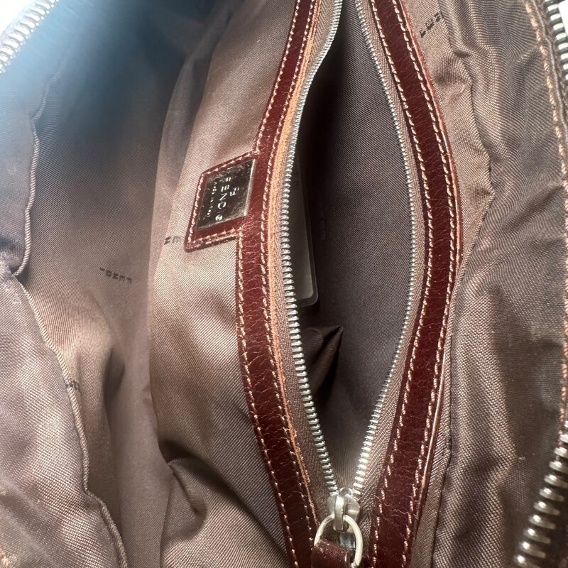 Fendi Zucca Bowling Buckle Bag<br />
<br />
Serial Code: 71-18560-0012<br />
<br />
Dimensions:<br />
Shoulder Strap Drop Max: 7.75<br />
Shoulder Strap Drop Min: 5<br />
Height: 5<br />
Width: 14.75<br />
Depth: 3.25<br />
<br />
In very good condition. Minor hardware scratches.<br />
<br />
Does not come with original dust bag or box.