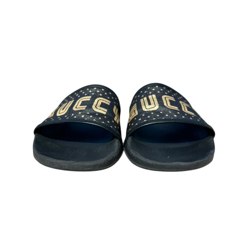 Gucci Guccy Black Slides<br />
<br />
Size 7<br />
<br />
In Good Condition.<br />
<br />
Does not come with the original dust bag or box.