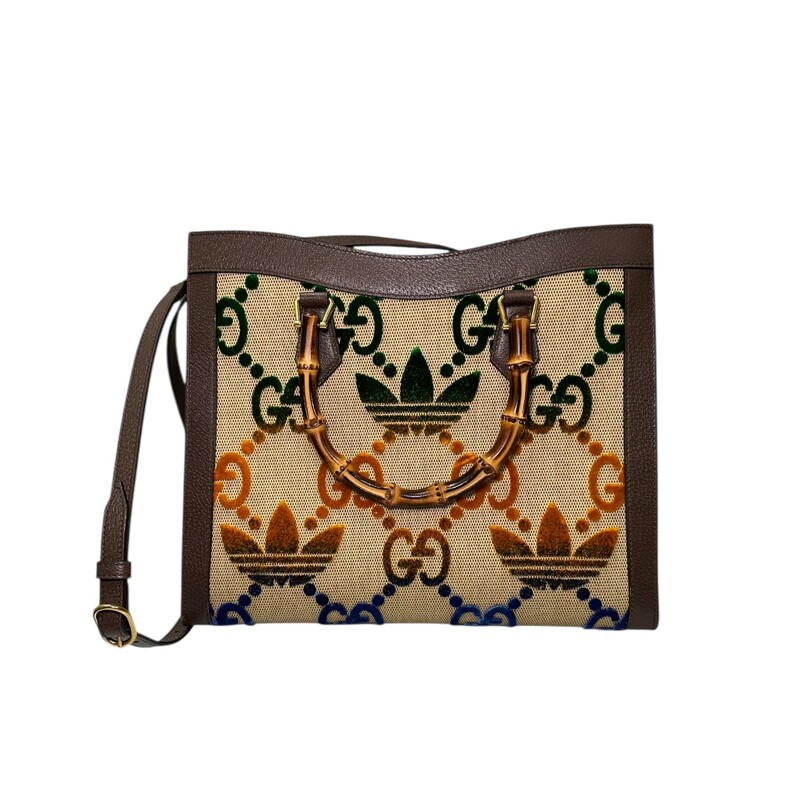 Gucci X Adidas Diana Mulitcolor Bamboo Tote<br />
<br />
Style Code:678842.520981<br />
<br />
Dimensions:13.5 L x 11 H inches<br />
<br />
In very good condition. This bag only includes one strap.Missing the second strap. Minor scratching on harware. Some interior marks.<br />
<br />
Does not come with original dust bag or box.