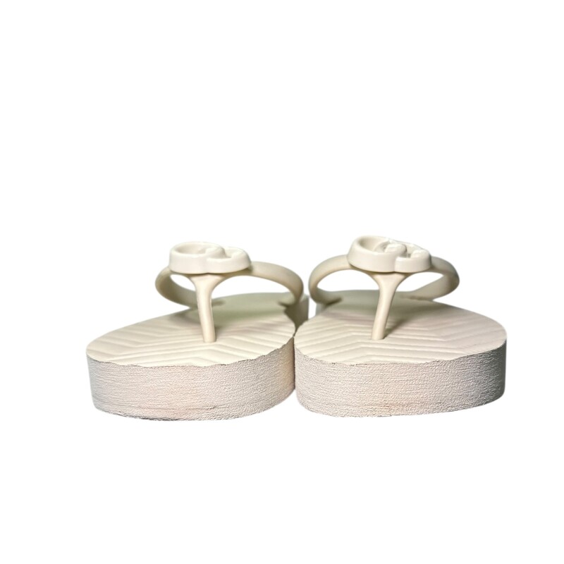 Gucci Double White G Rubber Flip Flop<br />
<br />
Size:  41<br />
<br />
Code: 655463<br />
<br />
Condition: Marks on side and top<br />
<br />
Does not come with dust bag or box.